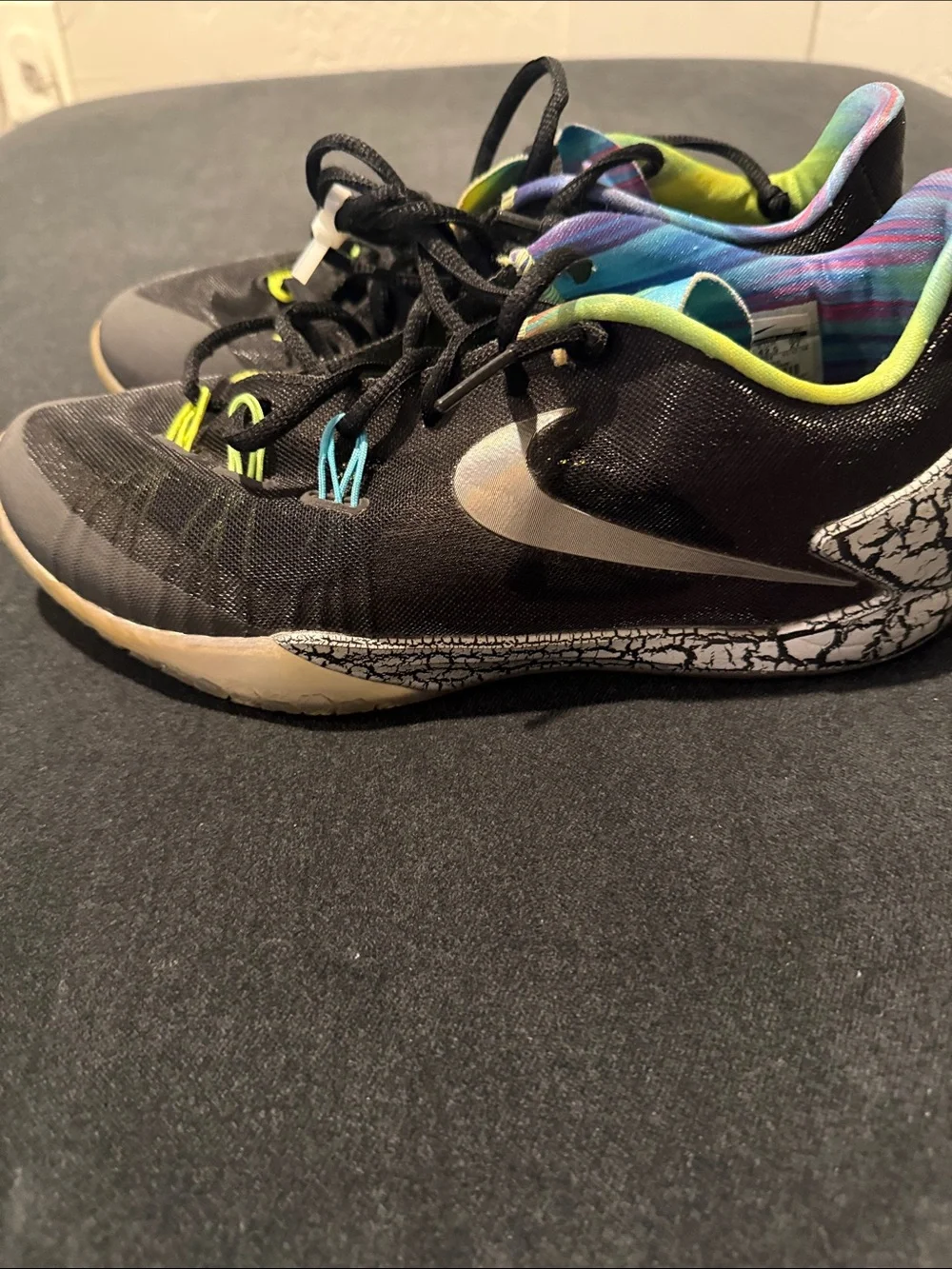 Nike Kids Black Sneakers with White Swoosh and Neon Lining